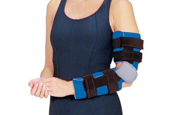 individual wearing elbow brace