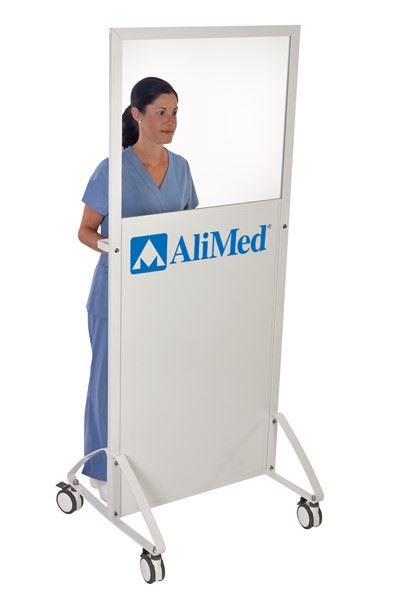 nurse standing behind AliMed mobile barrier