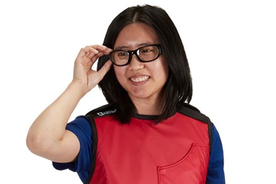 lady wearing radiation apron and glasses