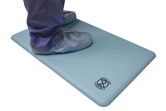 surgeon standing on surgical mat