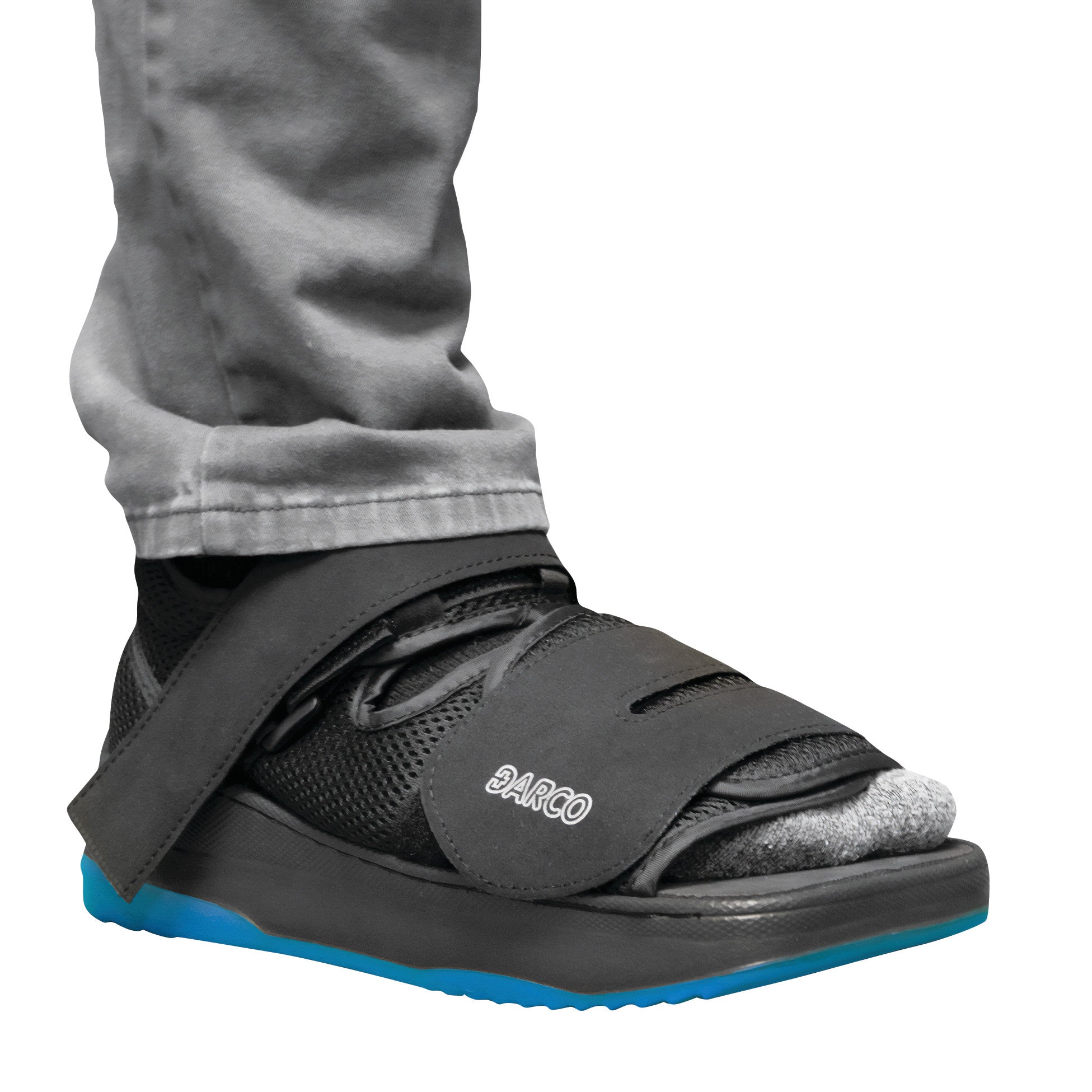 A DARCO MedSurg DUO shoe with a black mesh design, hook and loop straps, and a blue sole, designed for post-surgical use.