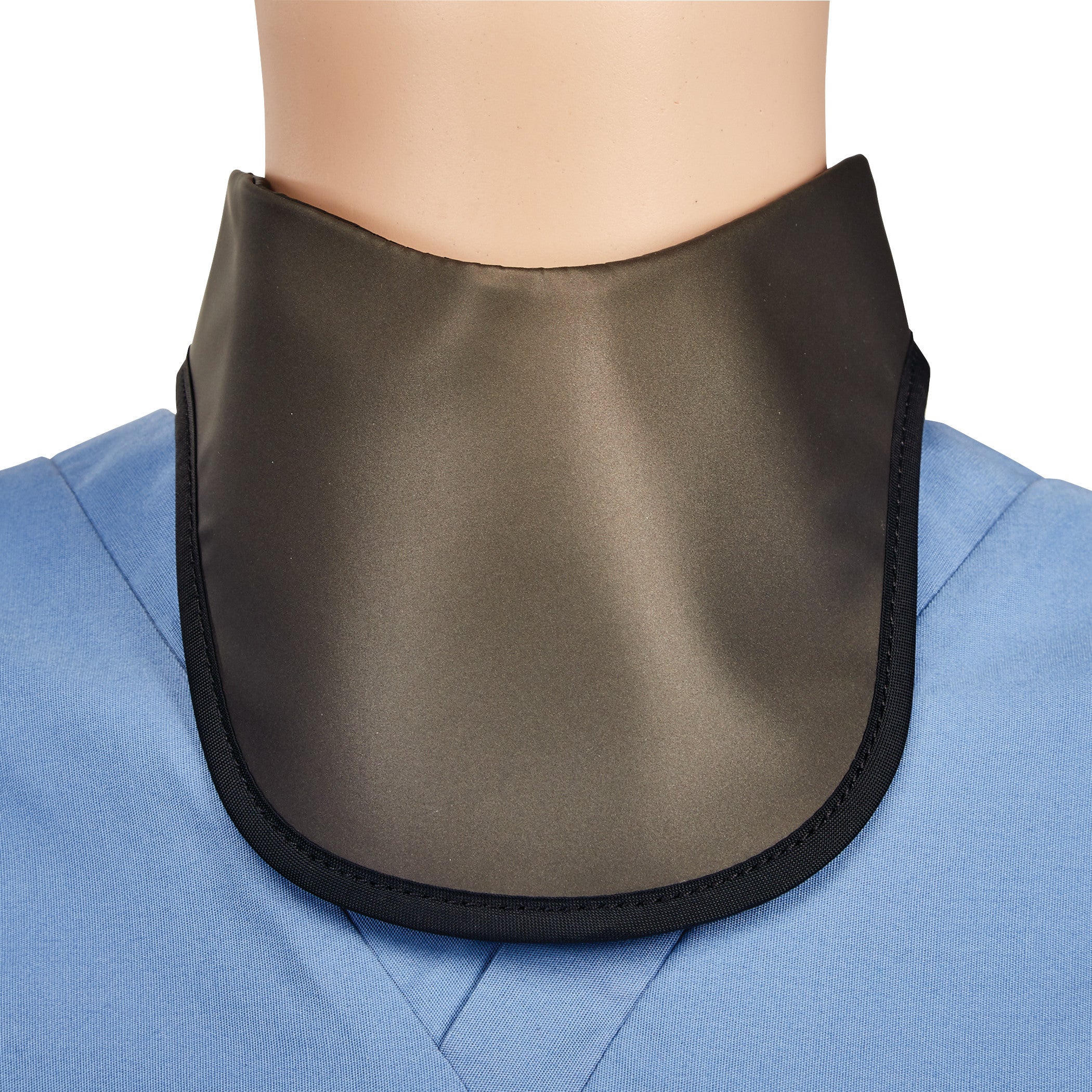 A mannequin wearing an AliMed Grab n Go Thyroid Shield over blue scrubs protects the neck area from exposure.