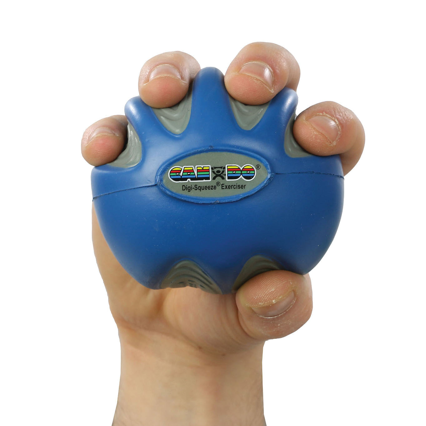 A hand grips a blue CanDo Digi-Squeeze Hand Exerciser, showing its flexible material and ergonomic design.