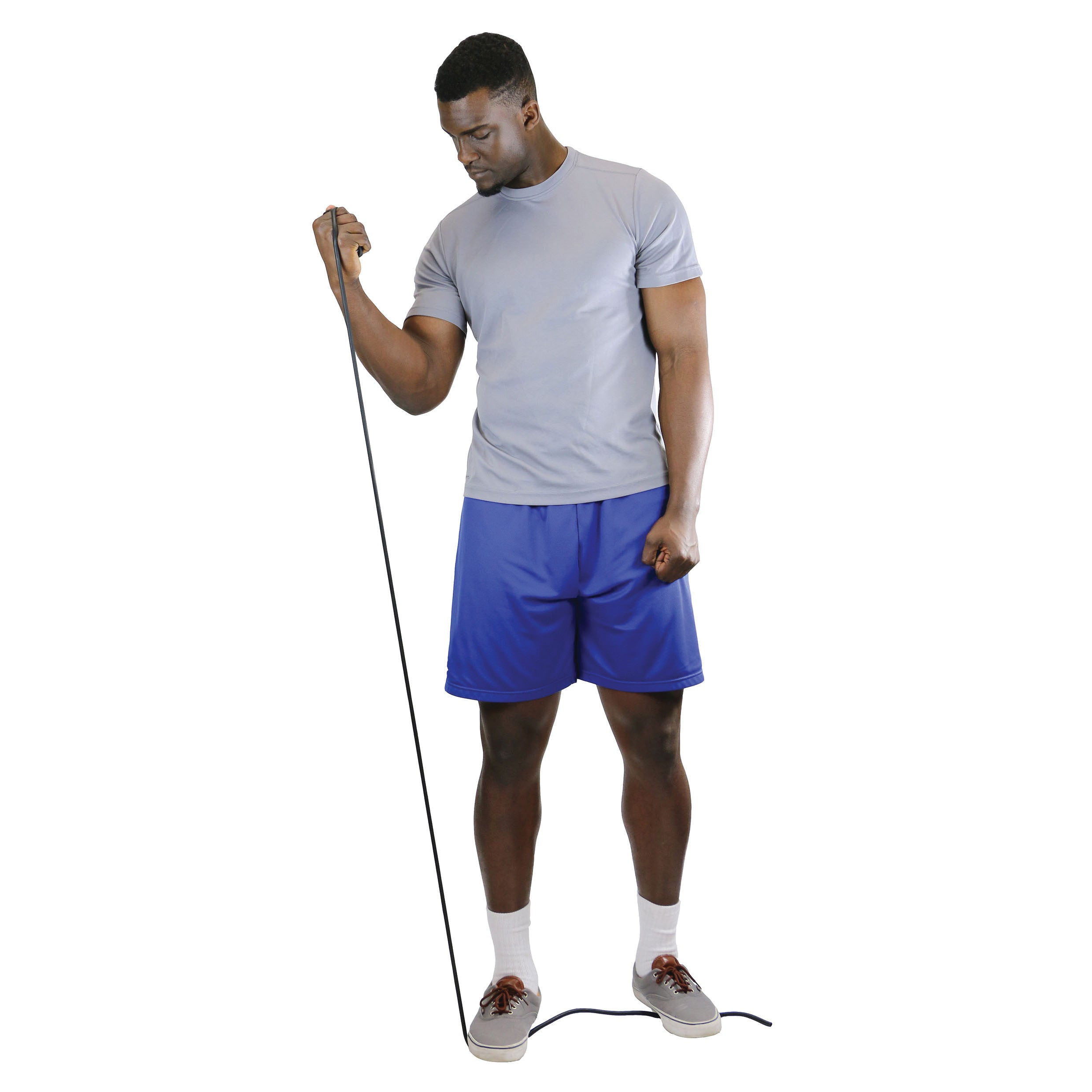 A man in gray and blue athletic wear is using CanDo Exercise Tubing, pulling it up while standing on the other end.