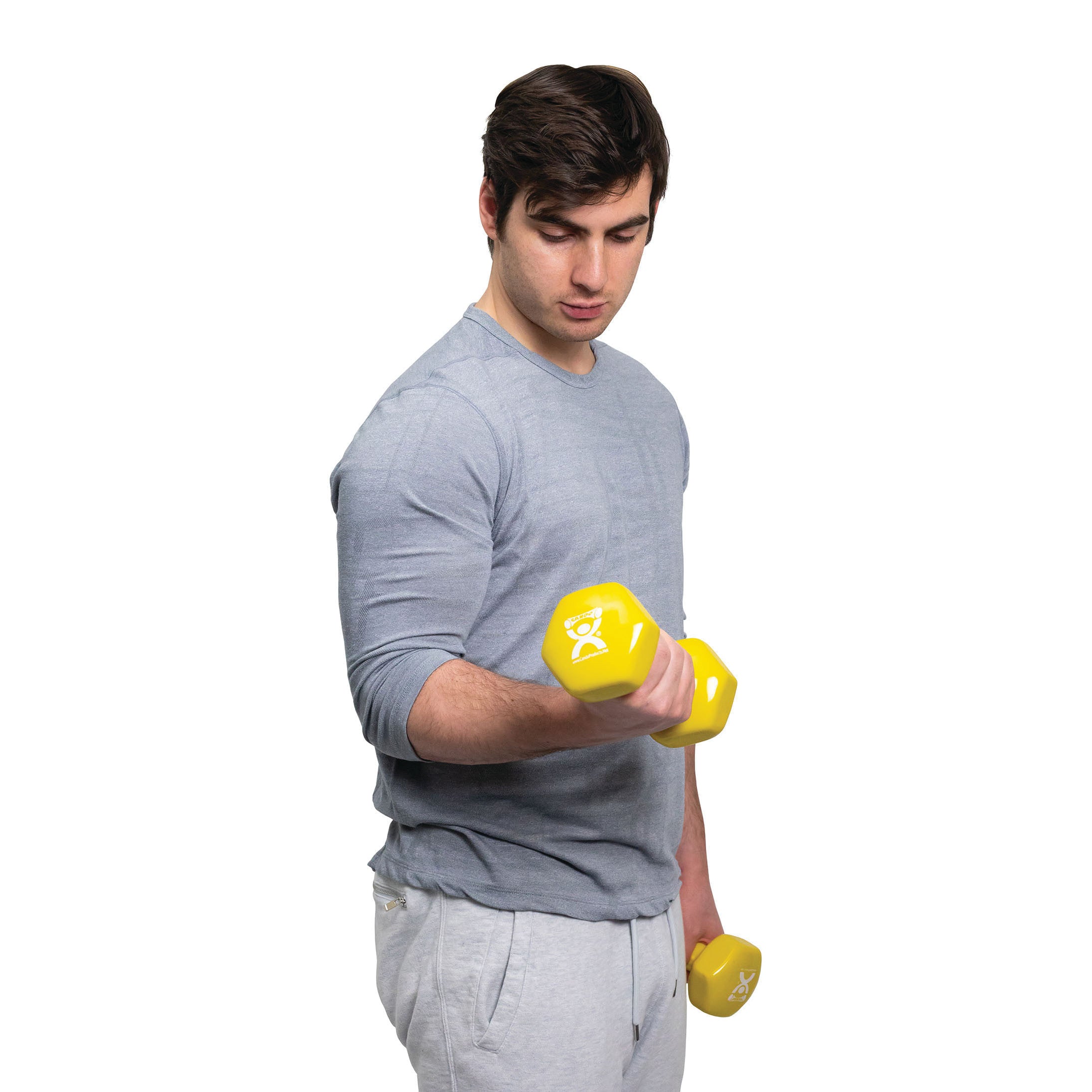 A person exercises with a 6 lb CanDo Vinyl-Coated Dumbbell, lifting a yellow dumbbell in one hand against a white background.