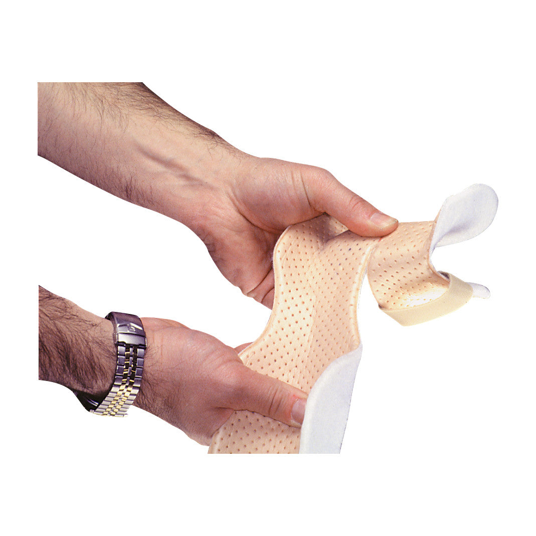 Two hands hold an AliMed Progressive Resting Splint, a beige perforated supportive brace with a white lining and straps.