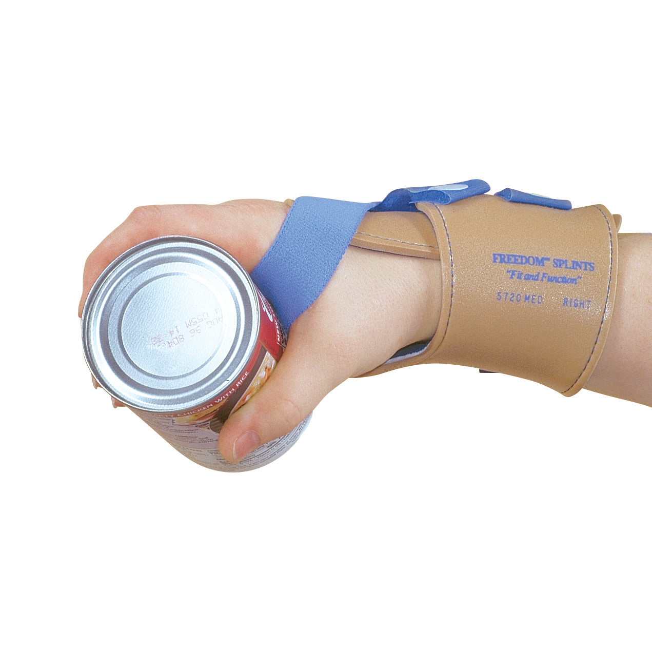 A hand wearing the AliMed FREEDOM Wrist-Trainer Gauntlet grasps a tin can. The gauntlet is tan and blue, offering wrist support.