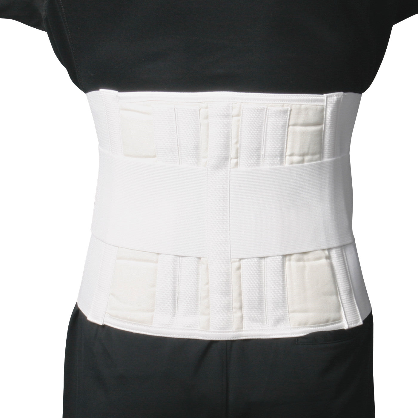 Person wearing the AliMed Lumbosacral Support Plus, a white back brace, over a black shirt, providing lumbar support.