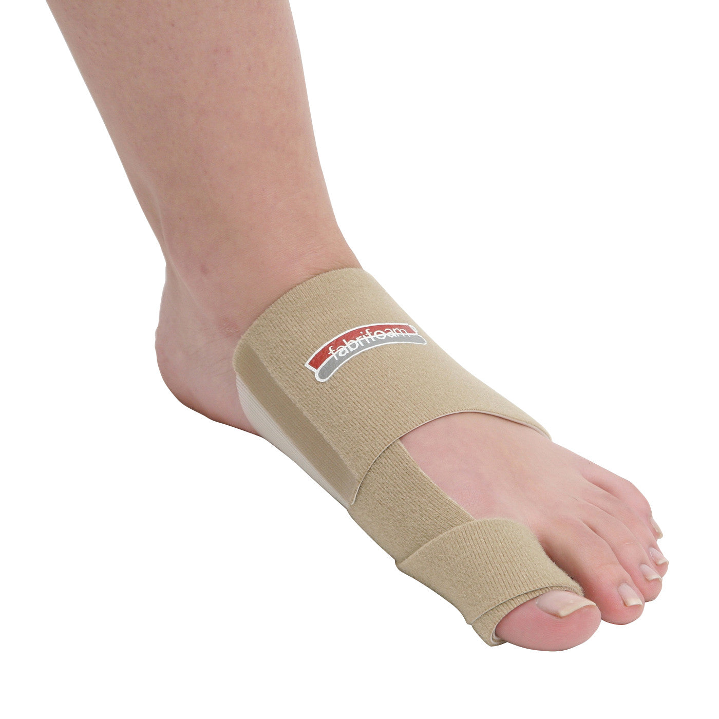 A foot wearing a beige "Bunion Sling" by Fabrifoam, with a snug fit around the big toe and mid-foot for support.