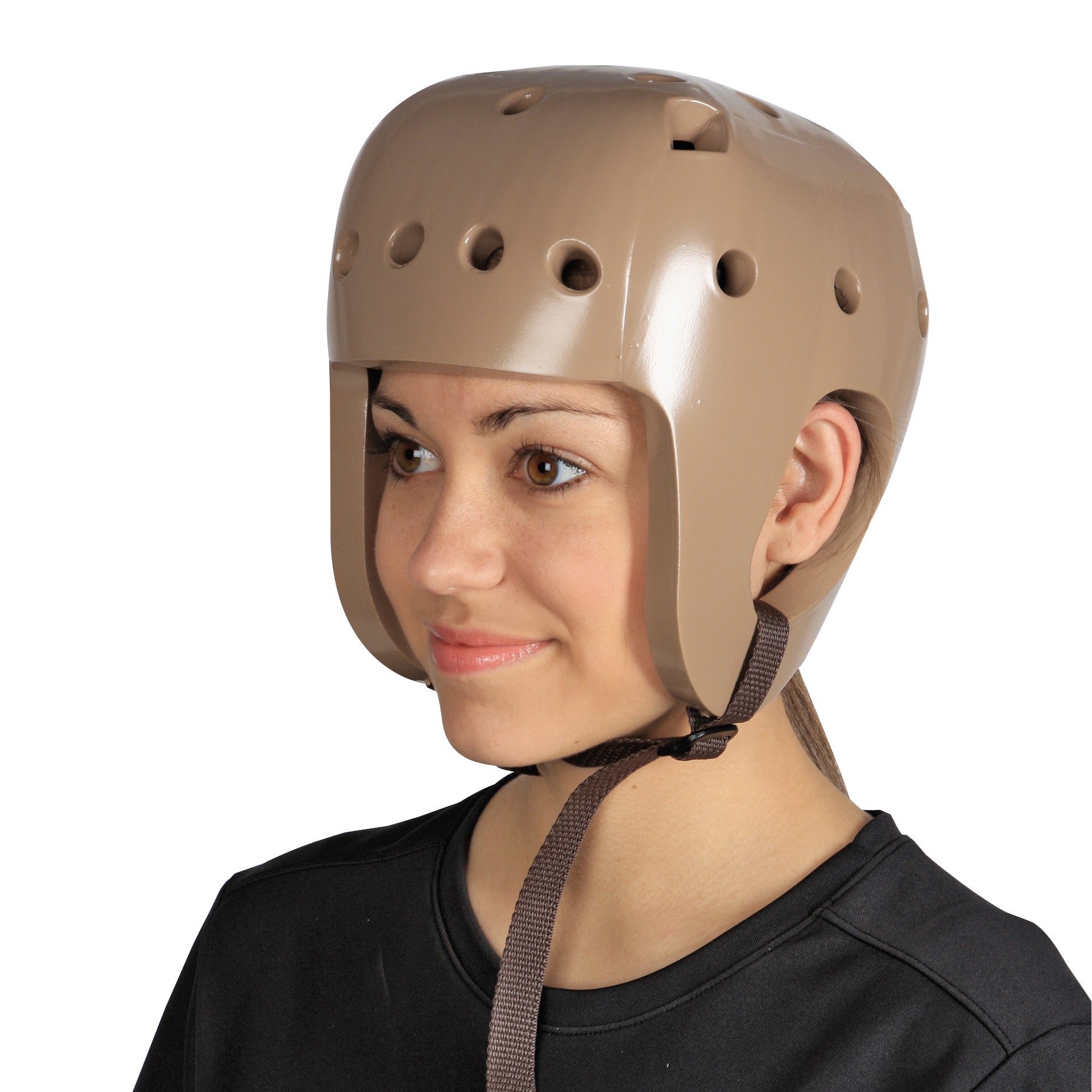 A person wearing a Danmar Products Full-Coverage Helmet in beige with ventilation holes and a chin strap, shown from the side.