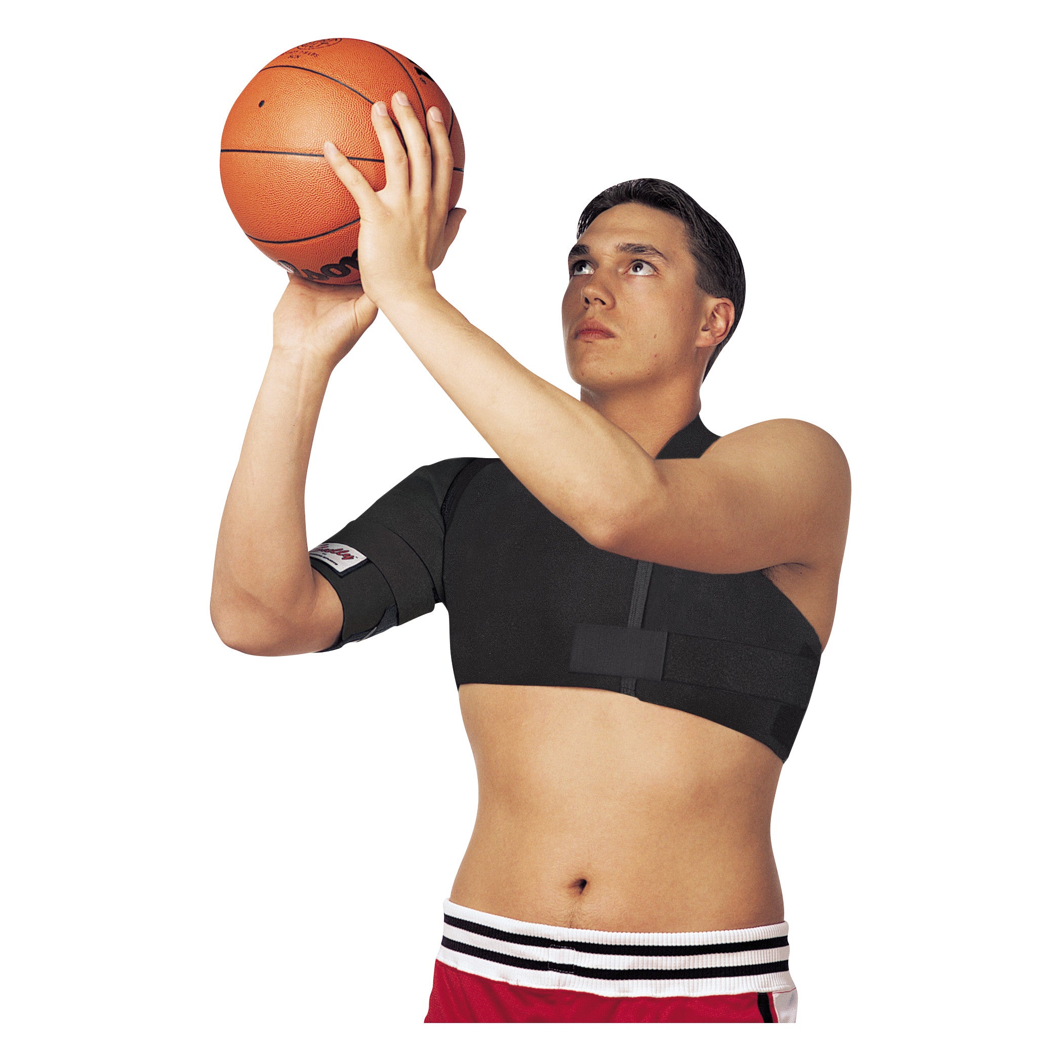 Person wearing a Sully Shoulder Stabilizer, holding a basketball, ready to shoot. The stabilizer is black and covers the shoulder.