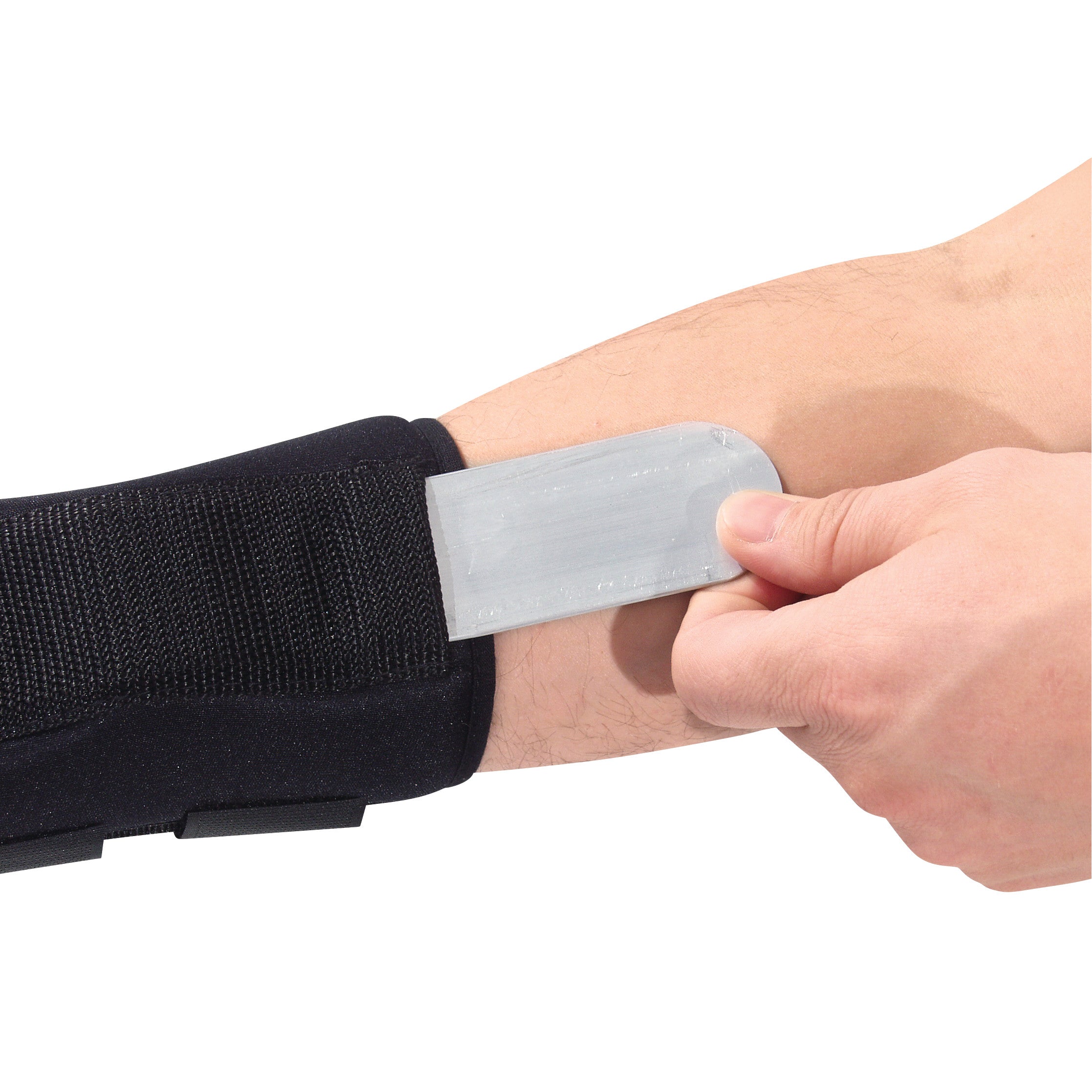 A person inserts a metal stay into the AliMed FREEDOM Comfort Wrist Support on their forearm.