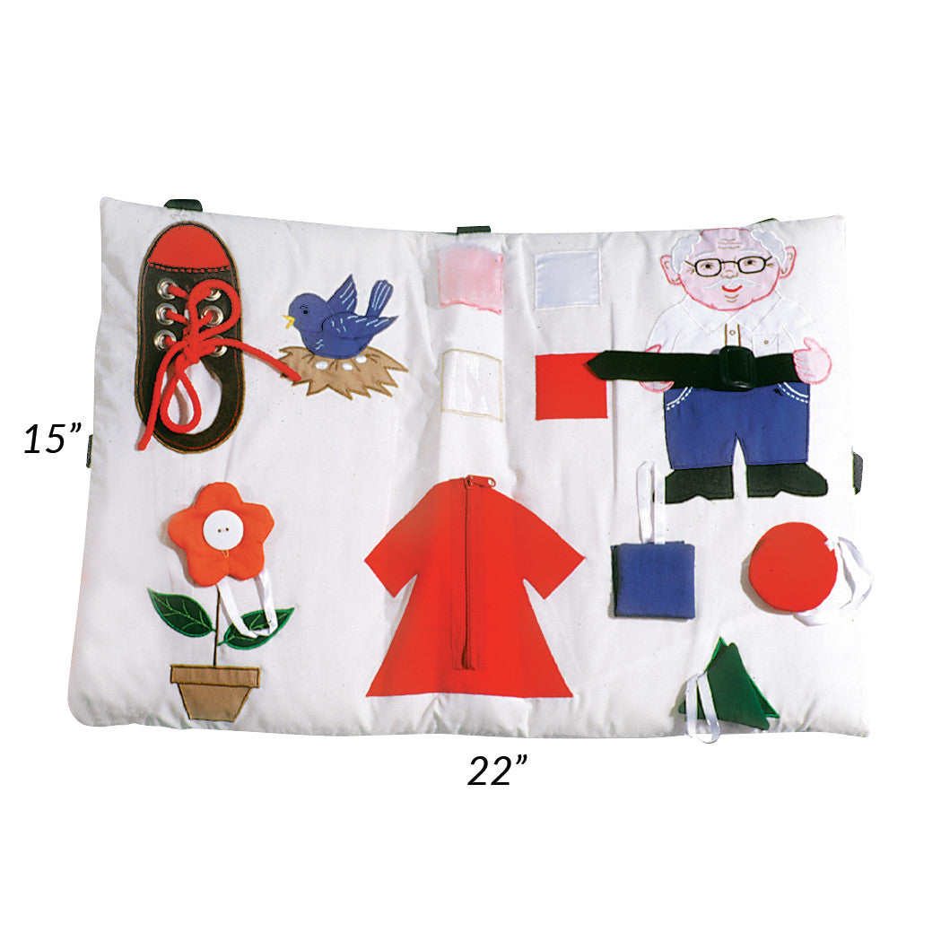 The Activity Pillow is a 15"x22" fabric panel with interactive elements like a shoe, bird, and clothing.