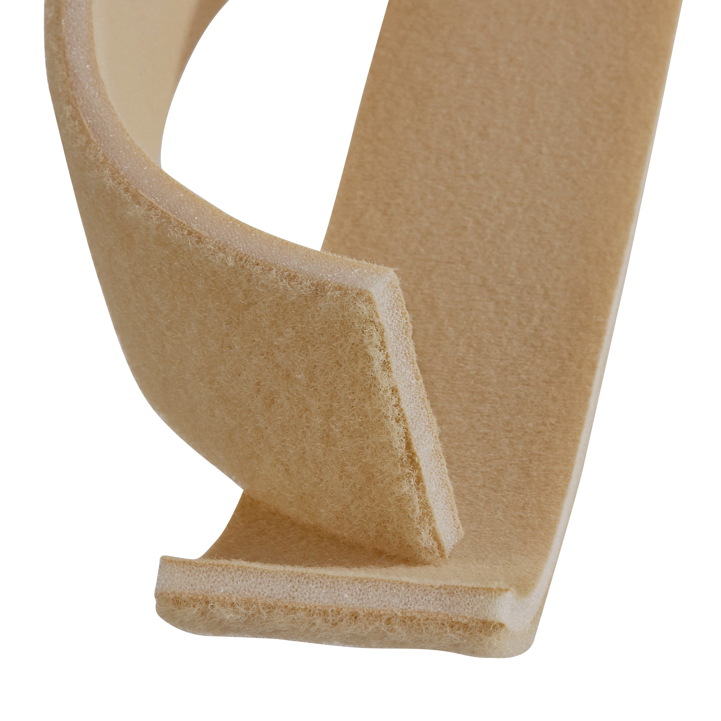 Close-up of AliMed Super Beta Pile II Loop, showing its textured, beige material and curved, rectangular shape.