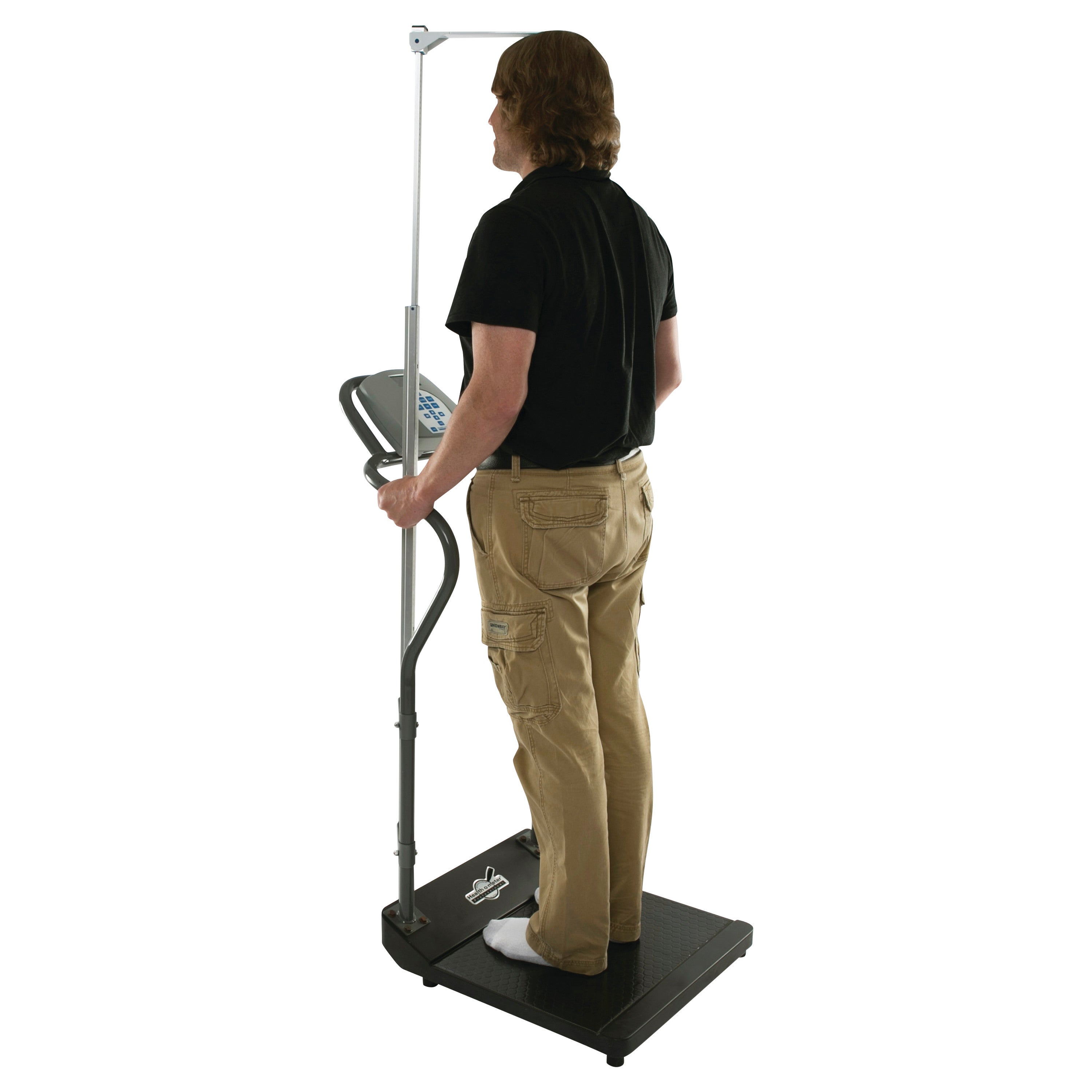 A person stands on a Health o meter Digital Platform Scale with Height Rod, measuring height and weight.