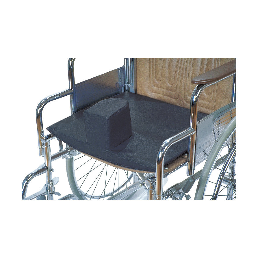 The AliMed Solid Seat Insert with Pommel is shown on a wheelchair seat, featuring a raised center support.
