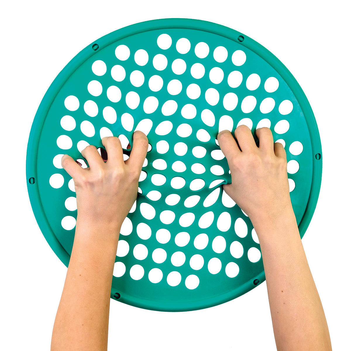 Hands grip a teal CanDo Hand Exercise Web with circular holes, used for finger and hand strengthening exercises.
