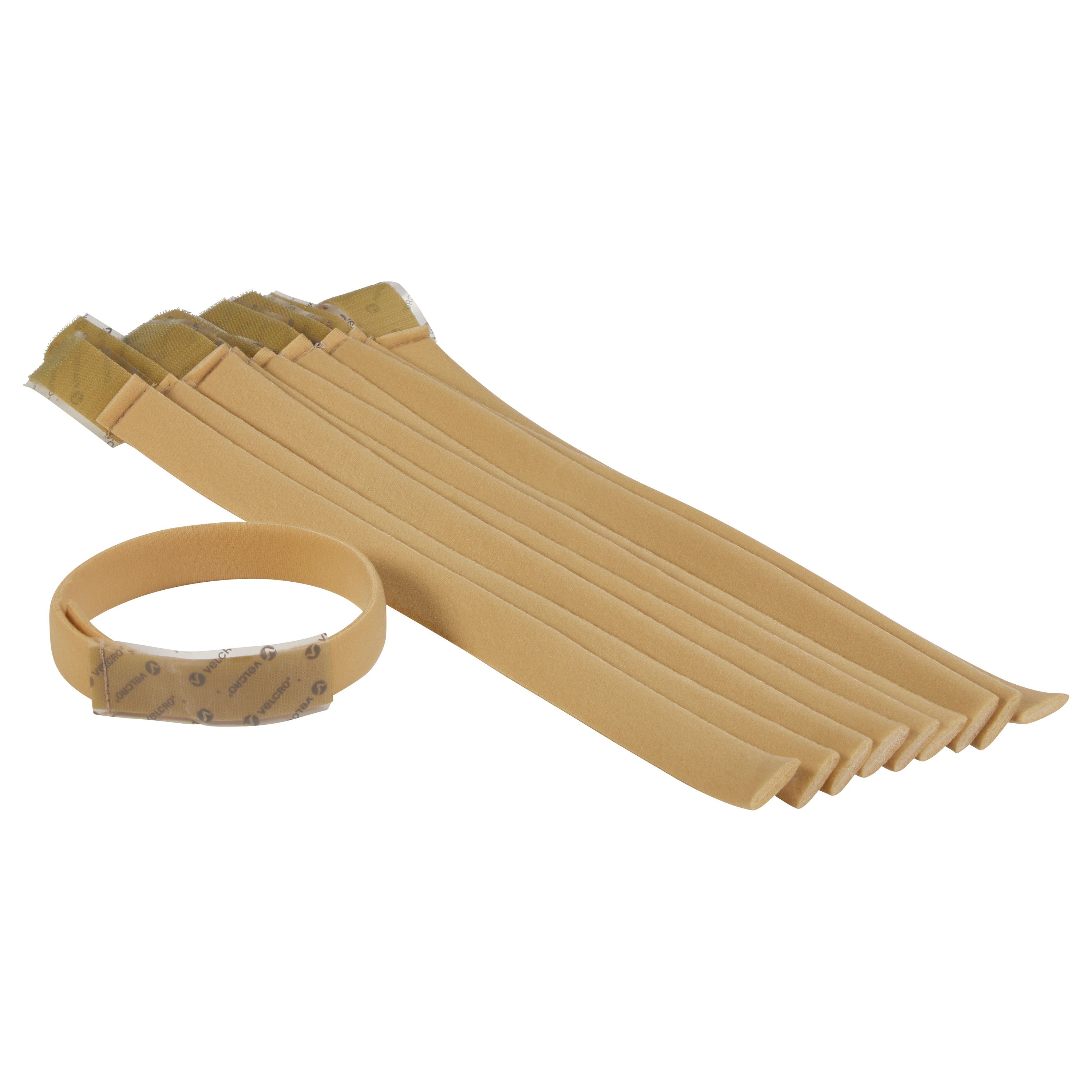 AliMed Beta Pile II Self-Adhesive Straps, in a light brown color, with several rolled and flat pieces visible.