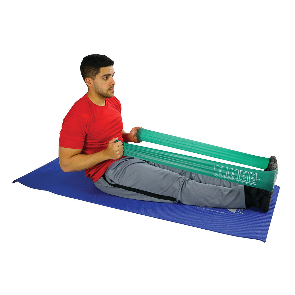 A person in a red shirt uses a green CanDo AccuForce Latex Exercise Band on a blue mat, performing a seated workout.