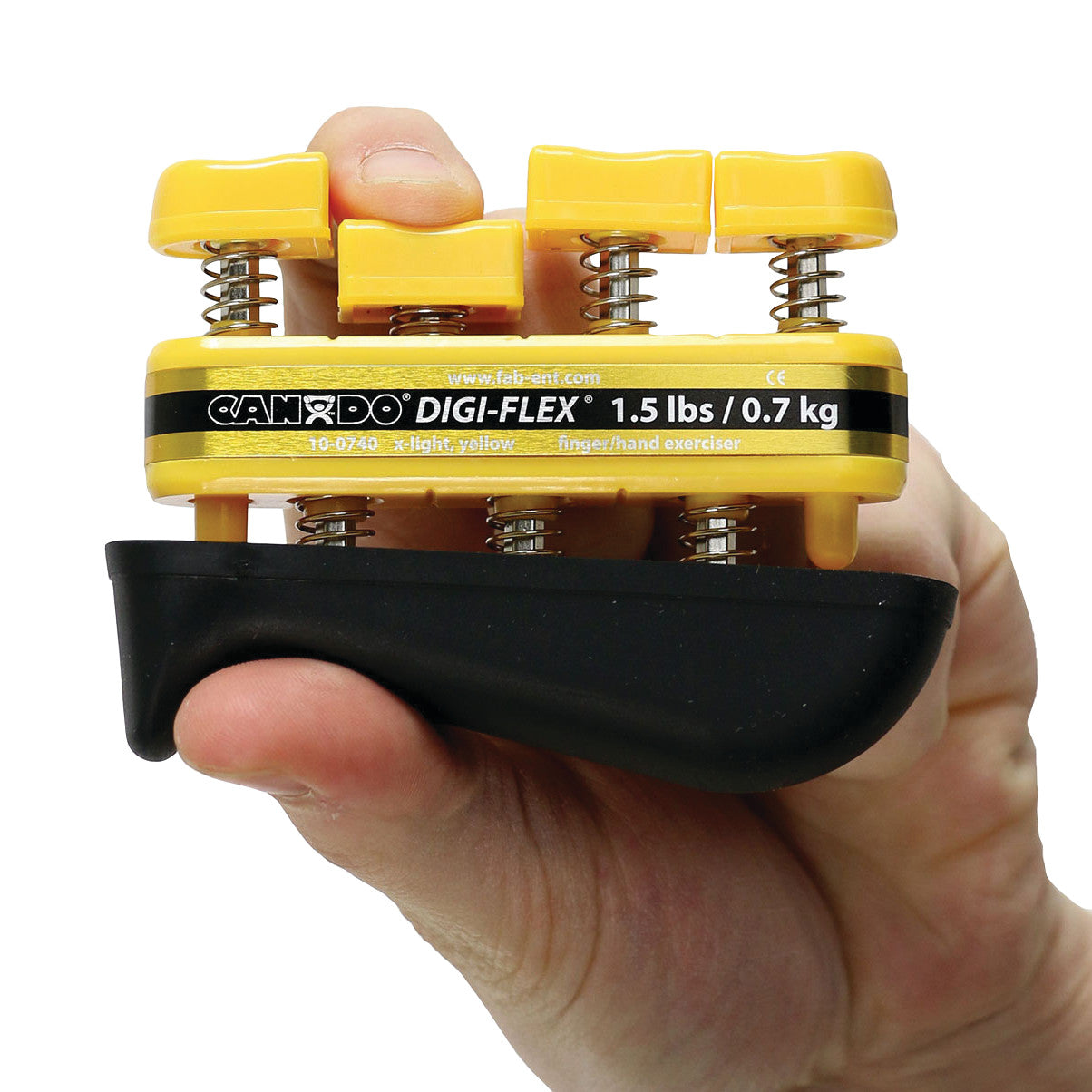 A hand holds a yellow CanDo Digi-Flex Hand Exerciser, labeled "1.5 lbs / 0.7 kg" for finger and hand strengthening.