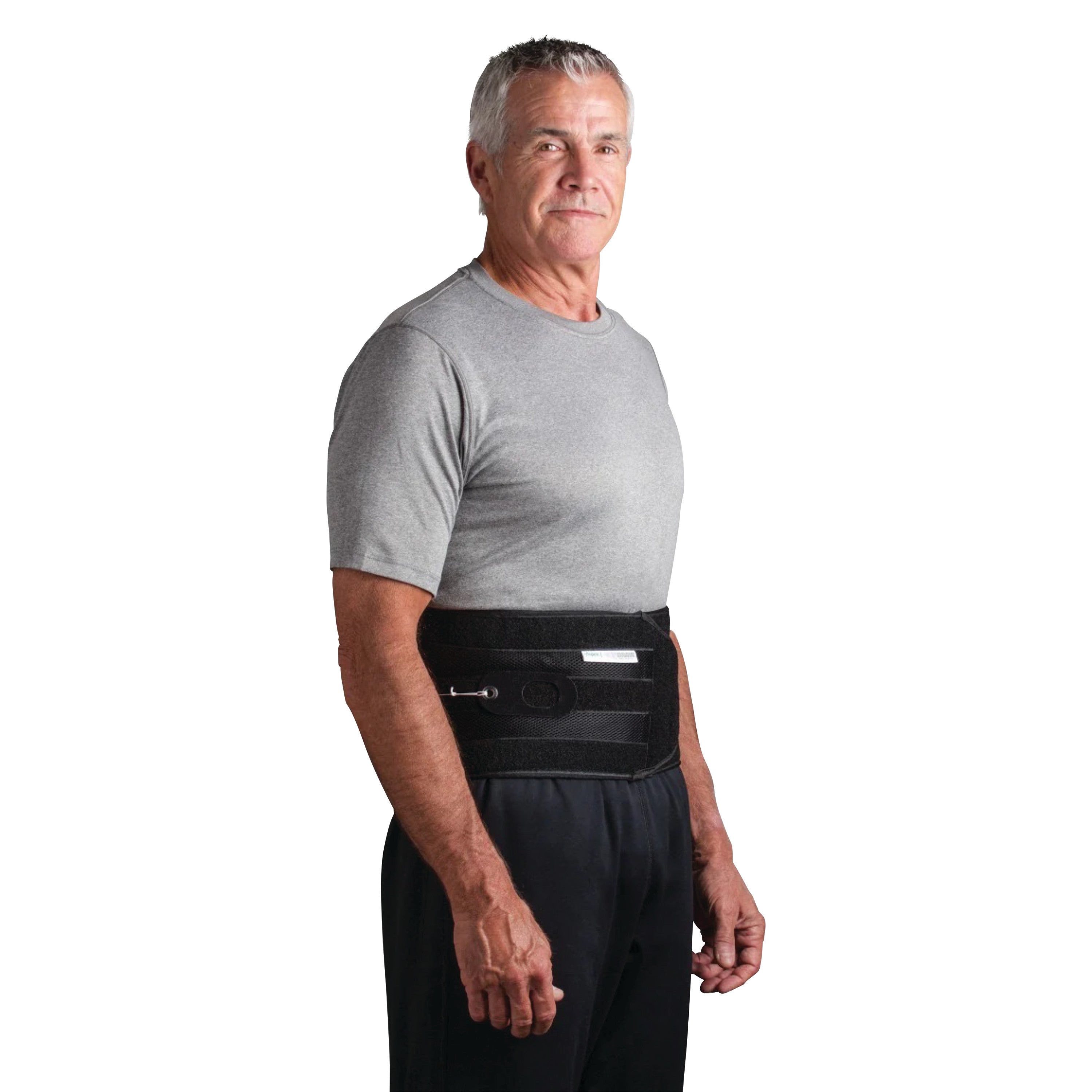 An older man wears the QuickDraw PRO Back Brace over a gray shirt, demonstrating its fit and design.
