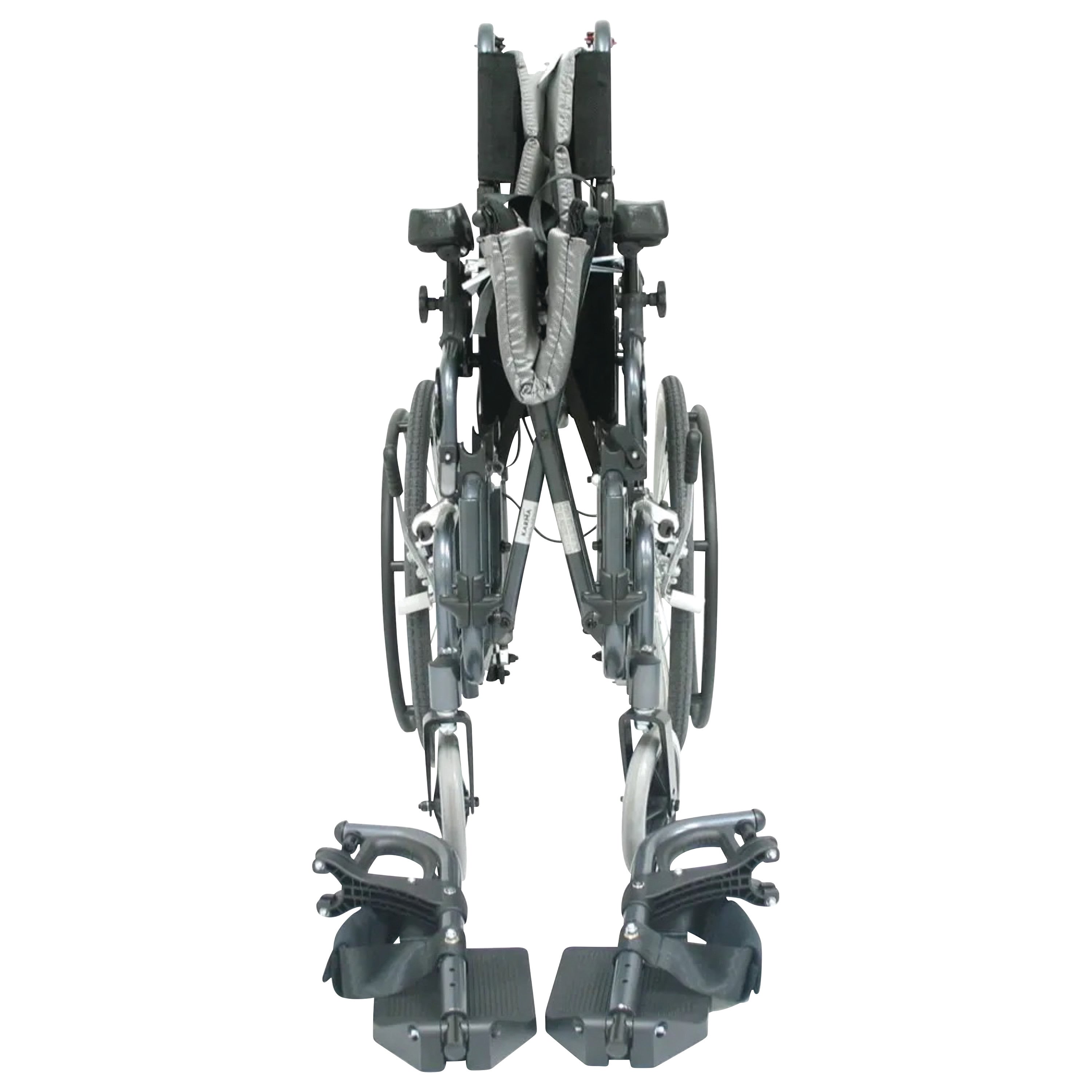 The Karman VIP Series 515 Tilt-in-Space Wheelchair is folded, showing its footrests, wheels, and padded seating from a front view.