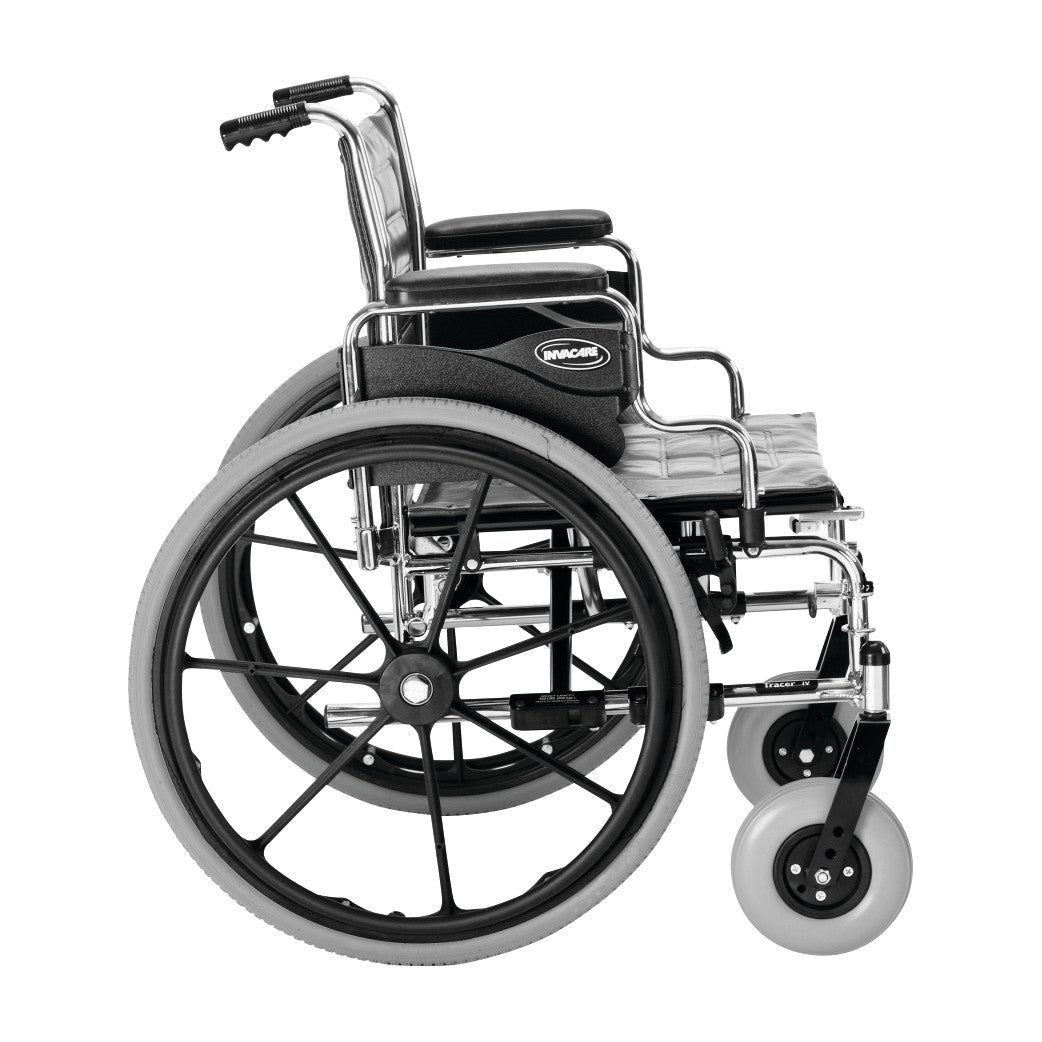 The Invacare Tracer IV Wheelchair with Desk Arms and Flat-Free Tires is shown in a side view, highlighting its sleek design.