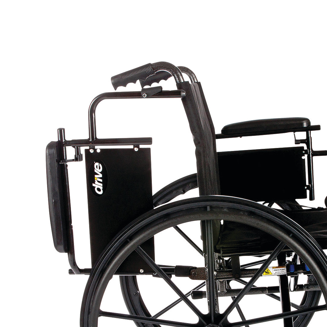 Side view of the Drive Medical Cruiser X4 Wheelchair with removable desk arms and elevating leg rests, showing the logo and wheel.