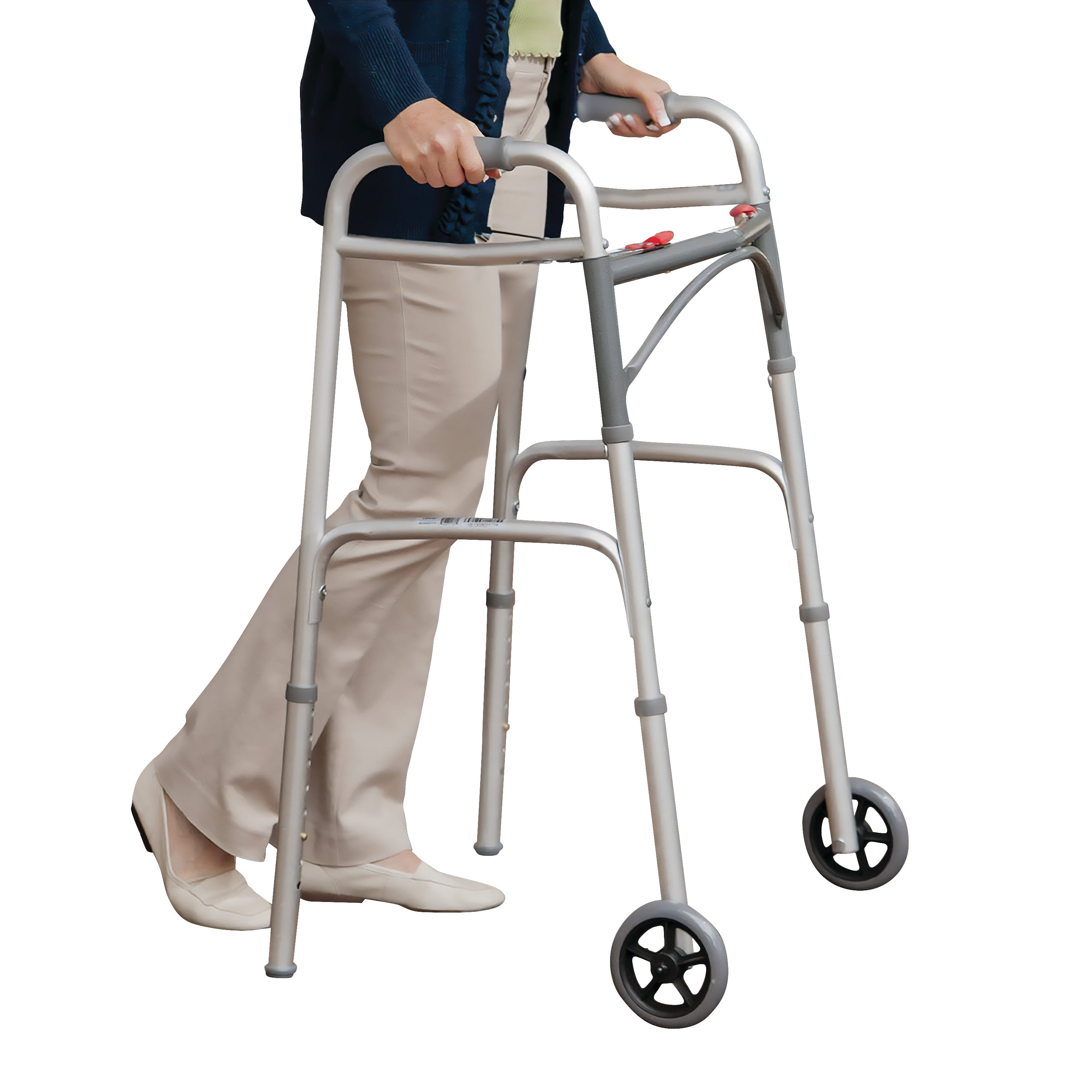 A person uses a Drive Medical Deluxe Folding Walker, which has two front wheels for mobility support.