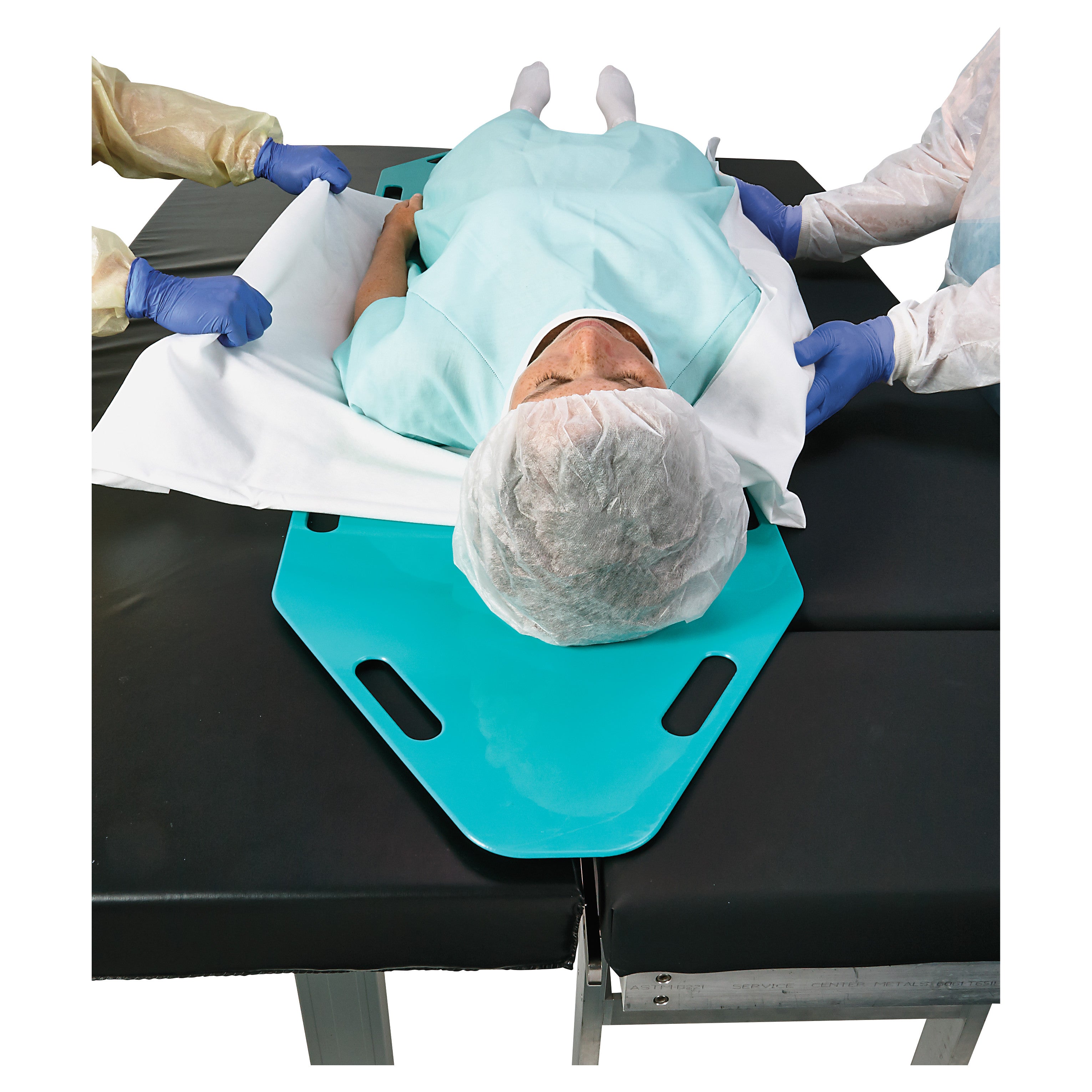 A person is being moved on an AliMed Anti-Stat Patient Shifter. Two medical staff in gloves assist with the transfer.