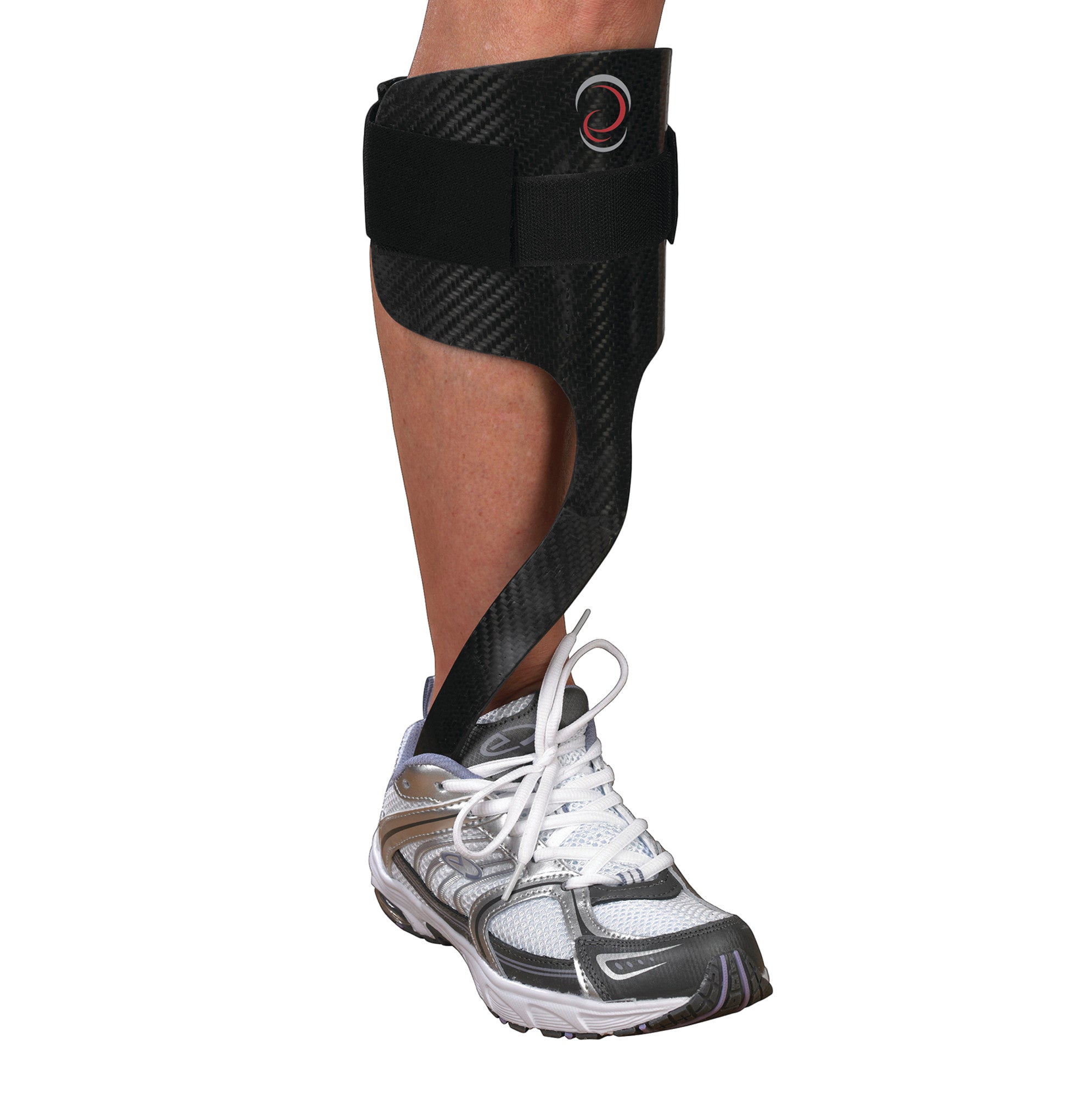 A leg wearing the Elite AFO Rehabilitator, a carbon fiber ankle-foot orthosis, with a sneaker and a Velcro strap for support.