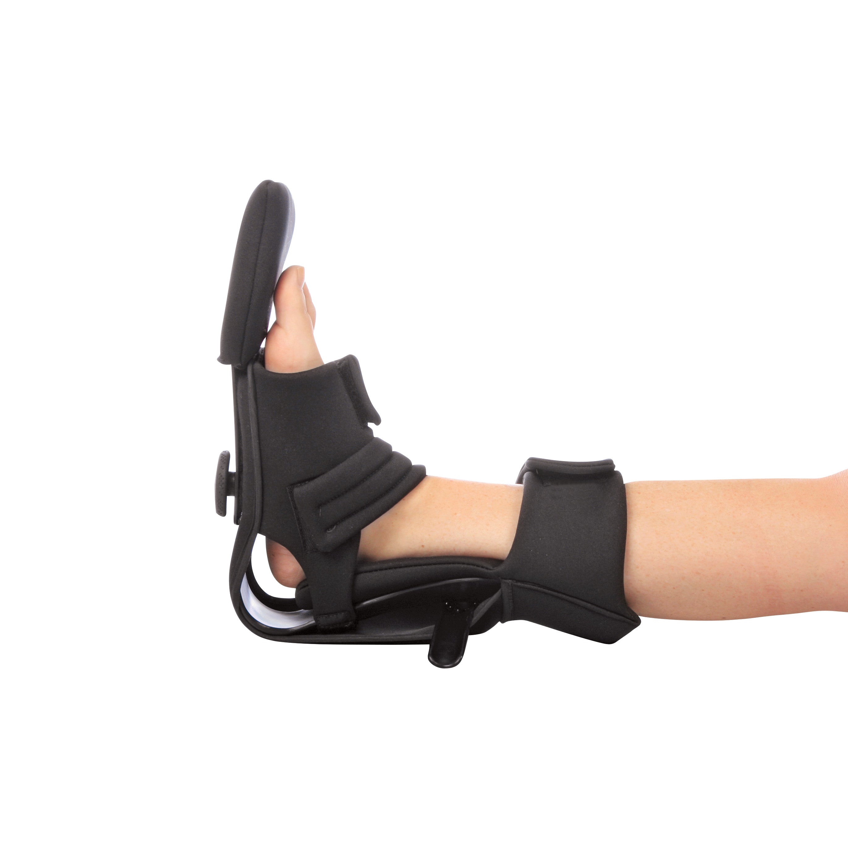 A person's leg wears an AliMed MultiBoot Xtra Contracture Boot, featuring black padding and straps, supporting the foot and ankle.