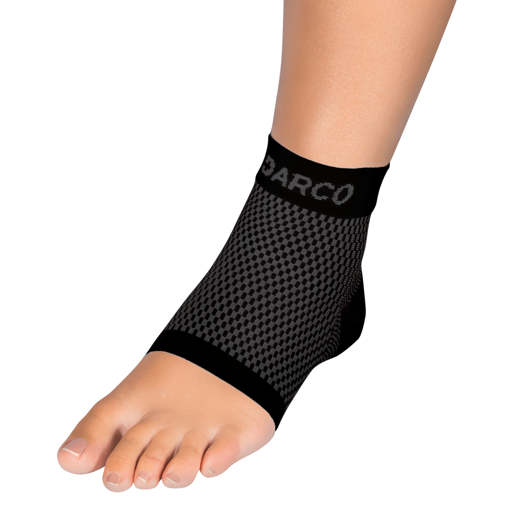 A foot is shown wearing a DARCO DCS Plantar Fasciitis Sleeve, which is black with a textured pattern and open-toe design.