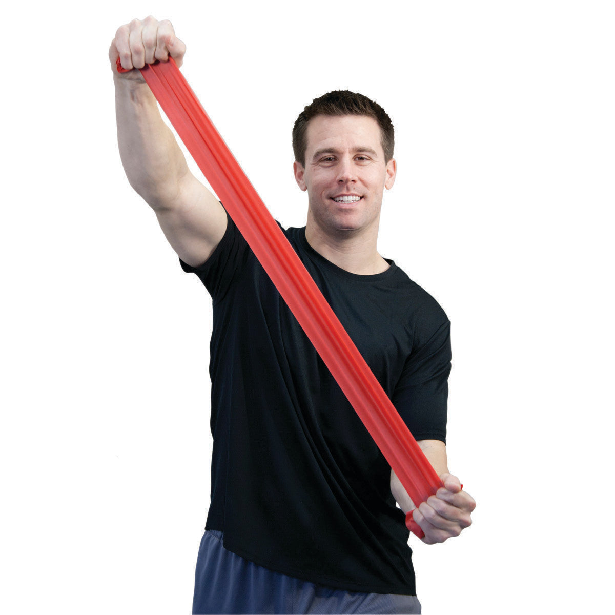 A person in a black shirt stretches a red CanDo Sup-R Band Non-Latex Exercise Band using both hands against a white background.