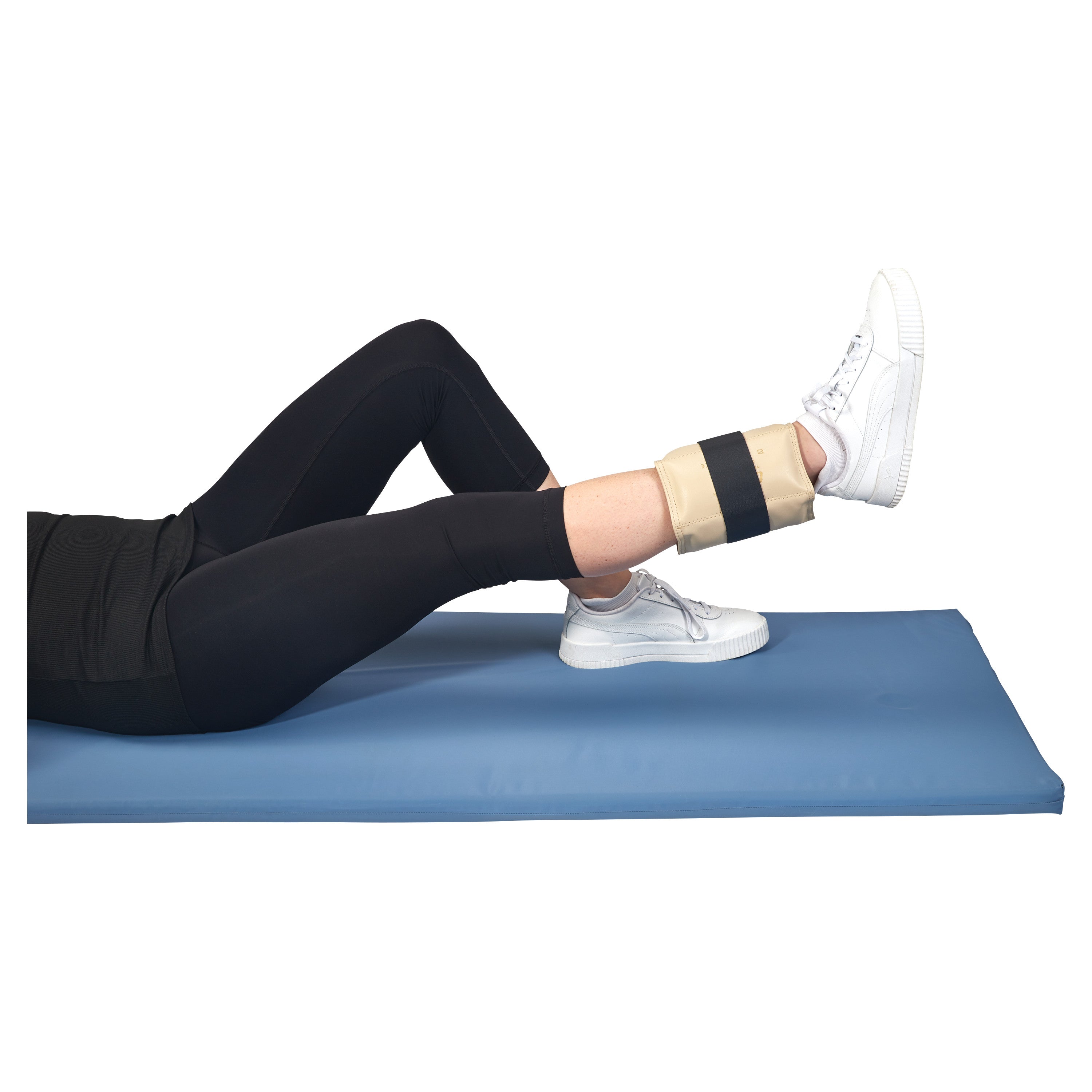 A person lies on a mat performing a leg exercise with an AliMed Color-Coded Cuff Weight attached around their ankle.