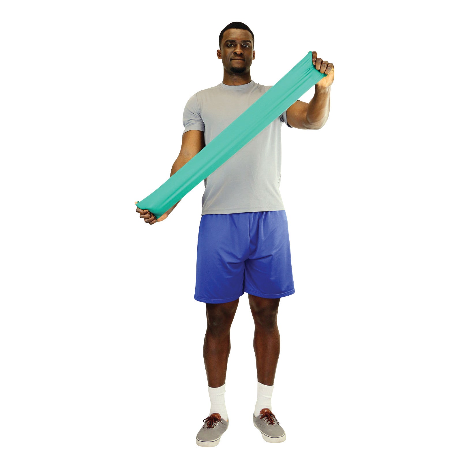 A person stretches a teal CanDo Latex Exercise Band while standing, wearing a gray shirt and blue shorts.