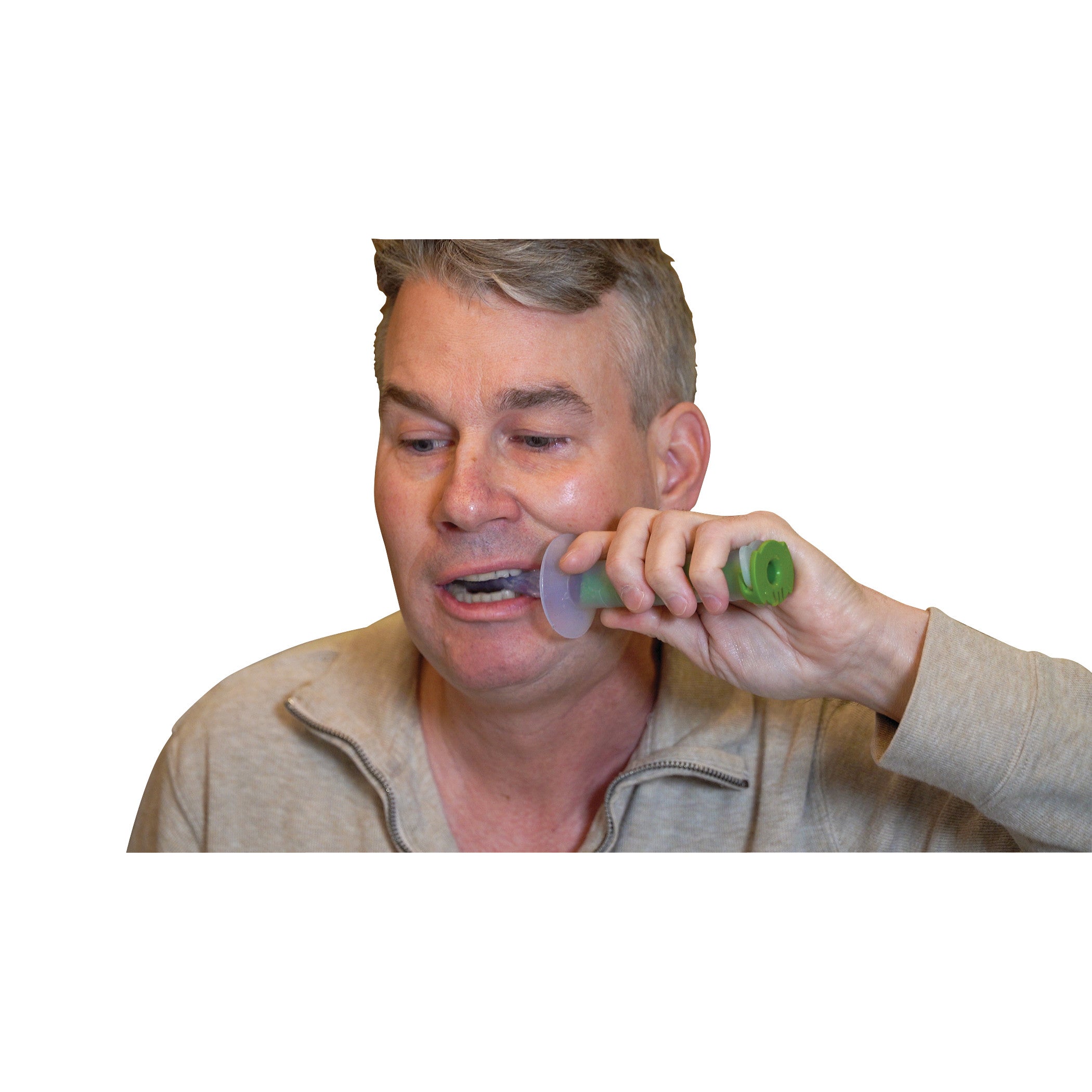 A man uses The Side Biter Chewing and Swallowing Therapy Tool, holding it near his mouth. The tool has a green handle.